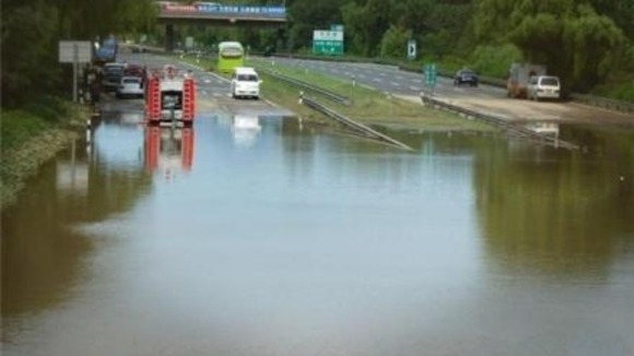 A flooded highway in Fangshan District in Beijing