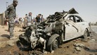 A policeman stands guard at the site of a bomb attack in Kirkuk, 250km (155 miles) north of Baghdad