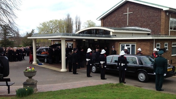 Funeral cortege arrives at crematorium in Stafford.