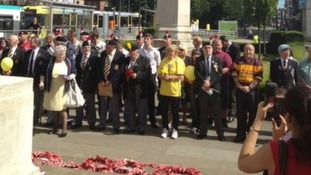 Families lay wreaths