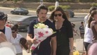 Christian Bale and his wife Sibi visit a make shift memorial to the Aurora victims.