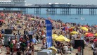 People on Brighton beach on Tuesday which was the hottest day of the year so far
