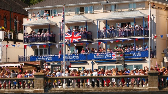 Crowds pack every available space in Cowes to see the Queen