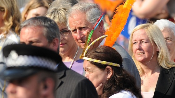 Prince of Wales watching the Olympic lame on the Torch Relay leg between Enfield and Haringey 