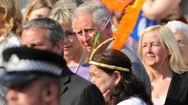 Prince of Wales watching the Olympic lame on the Torch Relay leg between Enfield and Haringey