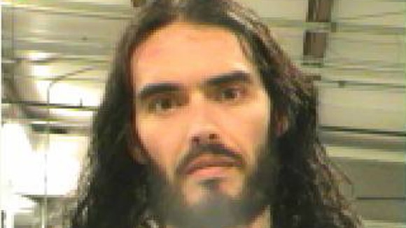 Police booking photograph of Russell Brand