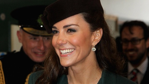 The Duchess presented shamrocks to the Irish Guards during her visit.