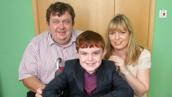 Ciaran Finn-Lynch with his parents Colleen and Paul.