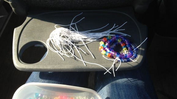 Supporters on the coach have been making bracelets