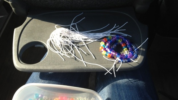 Supporters on the coach have been making bracelets