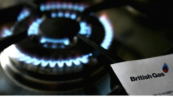 Gas hob with a British Gas bill as British Gas profits warm up