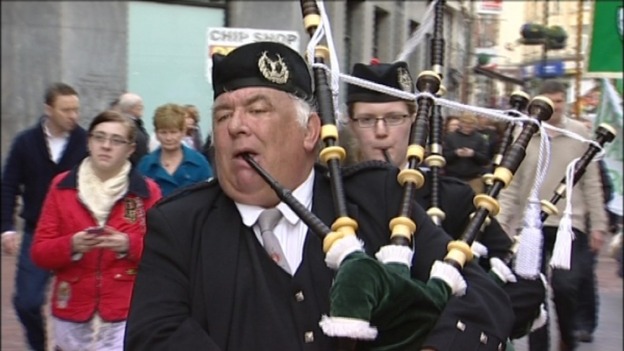 Bagpipe player taken part in parade in Derby