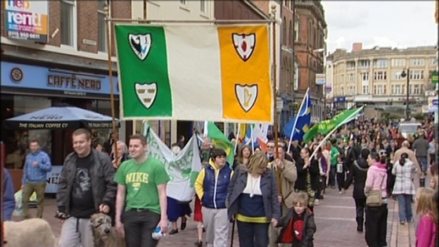 Hundreds of people taking part in the parade in Derby
