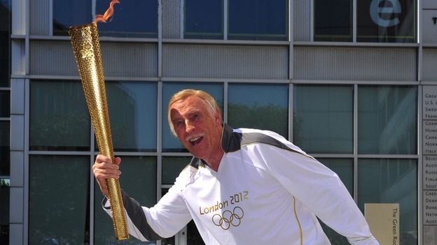 Sir Bruce Forsyth with Olympic flame
