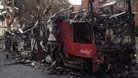 The burned-out bus.