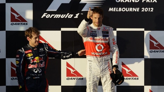 Button is congratulated by Red Bull's Vettel on the podium at the Albert Park circuit