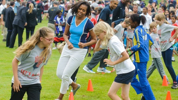 Michelle Obama joins in at the Let's Move event at the US Ambassadors residence in London.
