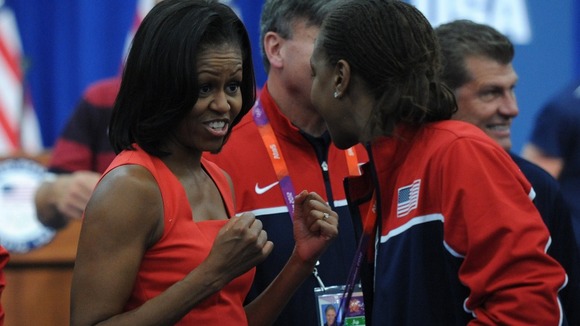 Michelle Obama meets American athletes at their Olympic base in London.