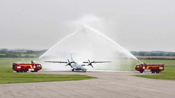 traditional water arch salute was provided by the Cambridge Airport Fire Crews