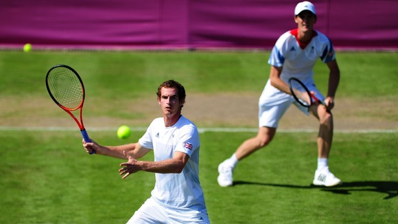 Andy and Jamie Murray practice at Wimbledon ahead of their first round doubles match.