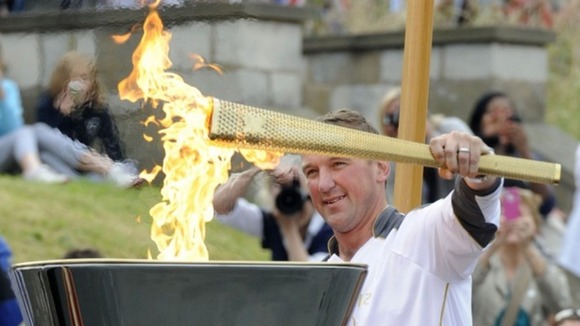 Matthew Pinsent lighting Olympic Cauldron