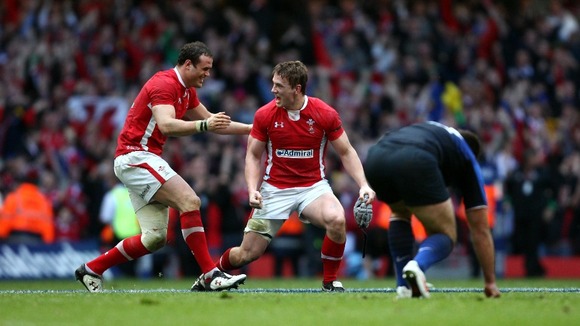 Roberts and Davies celebrate as the whistle blows