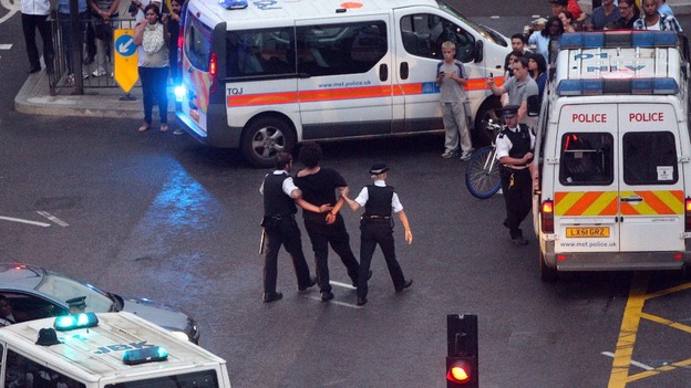 Police stop cyclists during 'critical mass' procession