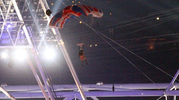 A parachutist doubling for the Queen at the Olympic Stadium