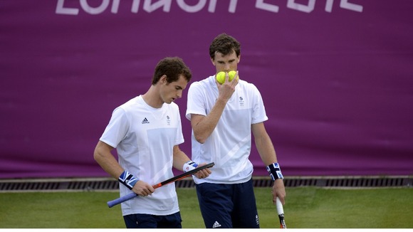 Great Britain's Andy and Jamie Murray during the First Round match at Wimbledon
