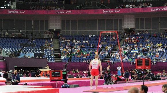 Empty seats are seen during the Artistic Gymnastics team qualification at the North Greenwich Arena