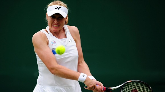 Elena Baltacha in action during day two of the 2012 Wimbledon Championships at the All England Lawn Tennis Club, Wimbledon.