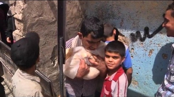 Boys in Aleppo collect bread.