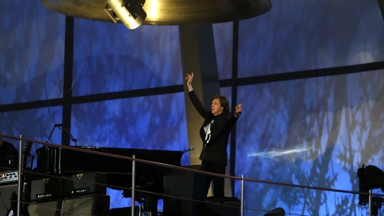 Sir Paul McCartney performs during the opening ceremony of the London 2012 Olympic Games at the Olympic Stadium.