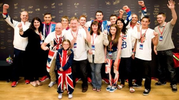 Male Gymnasts joined by family