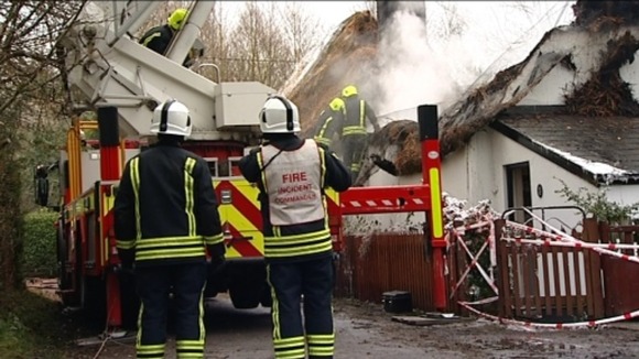 Fire fighters at house fire