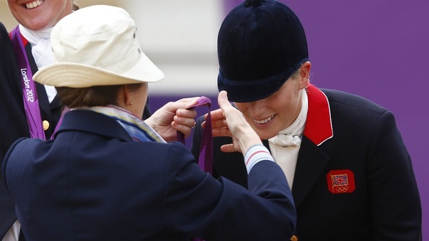 The moment Zara Phillips was presented with her silver medal by her mother the Princess Royal