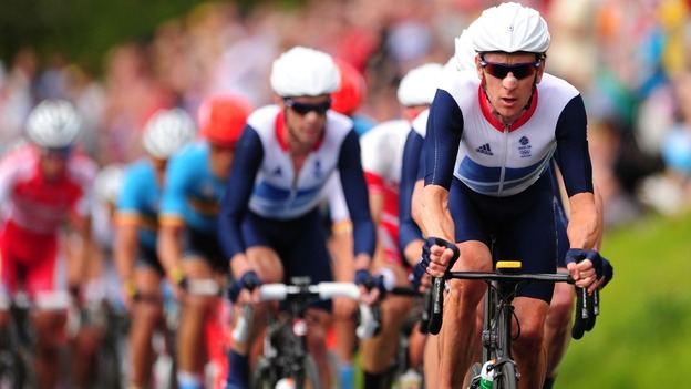 Great Britain's Bradley Wiggins leads the Peleton up Box Hill during the Men's Road race, Box Hill.