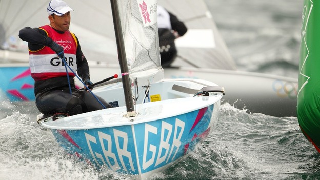 Great Britain's Ben Ainslie rounds the first weather mark during racing in the Finn class in Weymouth today