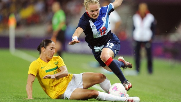 Brazil's Daiane and Britain's Little collide during their women's Group E football match at London 2012.