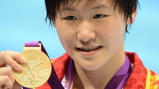China's Shiwen Ye with her gold medal after winning the women's 200m individual medley final at the Aquatics Centre on Tuesday.