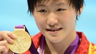 China's Shiwen Ye with her gold medal after winning the women's 200m individual medley final at the Aquatics Centre on Tuesday.