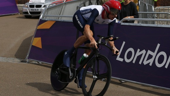 Bradley Wiggins competes in the men's cycling individual time trial