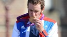 Bradley Wiggins kisses his gold medal after winning the men's cycling individual time trial