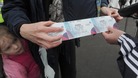 A genuine Olympic ticket is checked