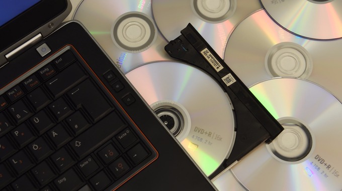 A laptop with a DVD drive.