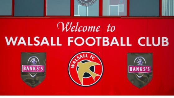 Walsall FC have singed winger James Baxendale.