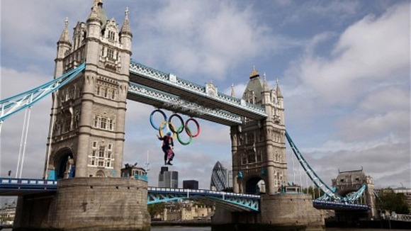 Dangling from Olympic rings on Tower Bridge.