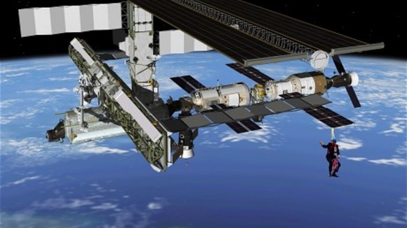 The Mayor hangs from the International Space Station.