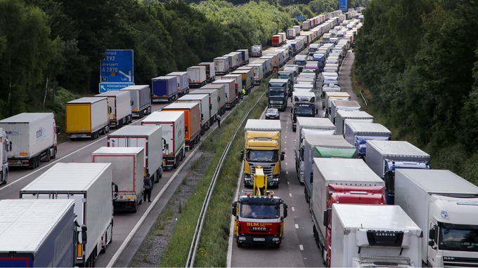 Lorries queue along the north and southbound carriageways of the M20 in Kent on Wednesday.