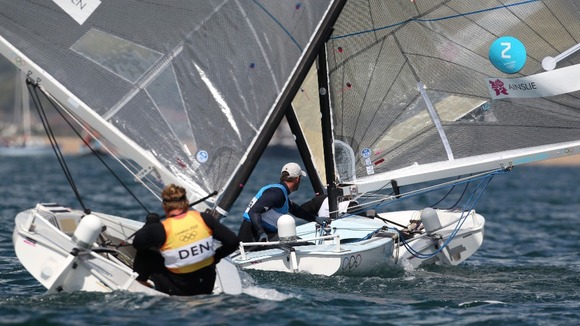 Great Britain's Ben Ainslie and Denmark's Jonas Hogh-Christensen (left) battle for position 